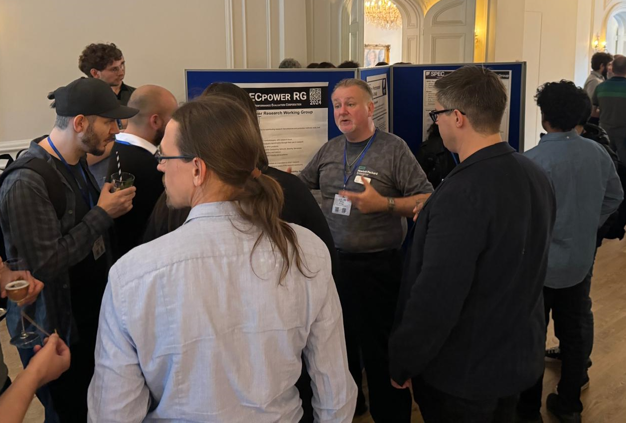 Klaus Lange presenting the SPECpower Research Group poster to session attendees